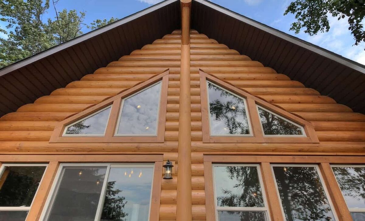 half round log siding chinkless gable wall