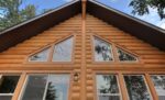 half round log siding chinkless gable wall